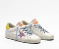Golden Goose Superstar sneakers with pink glittery star and yellow heel tab